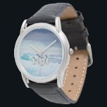 Ice & Snow | Adelie Penguins Antarctica Watch<br><div class="desc">This amazing Getty Images photo features a group of Adelie penguins rest on vivid blue ice in Antarctica.</div>