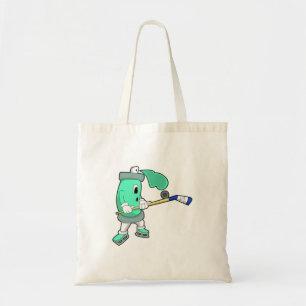 Ice spray at Ice hockey with Ice hockey stick Tote Bag