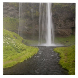 Iceland. People on trail behind Seljalandsfoss Tile