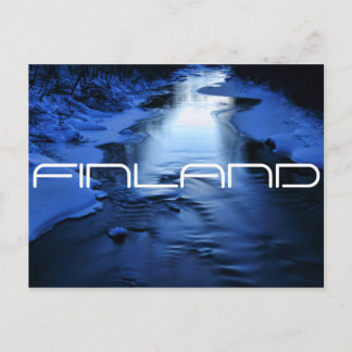 Icy blue river on cold winter evening postcard