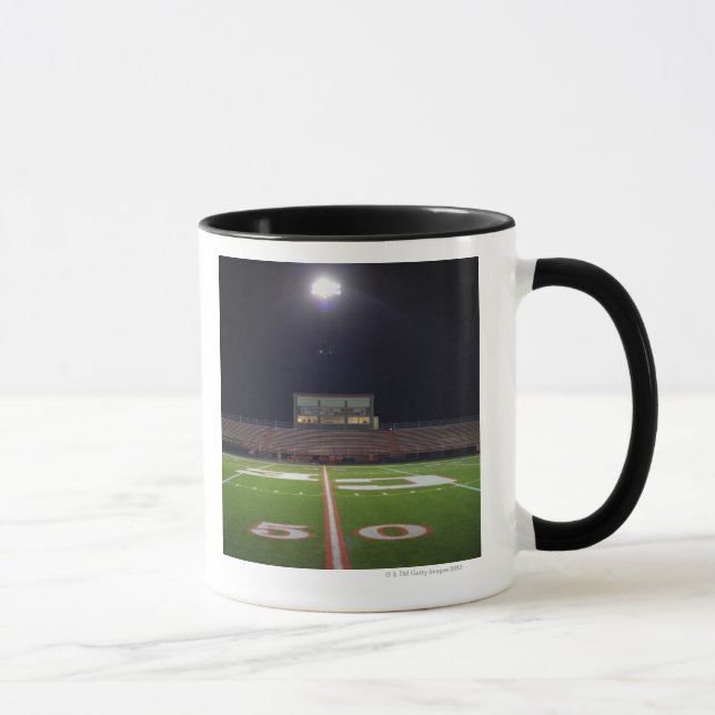 Illuminated American football field at night Mug (Right)