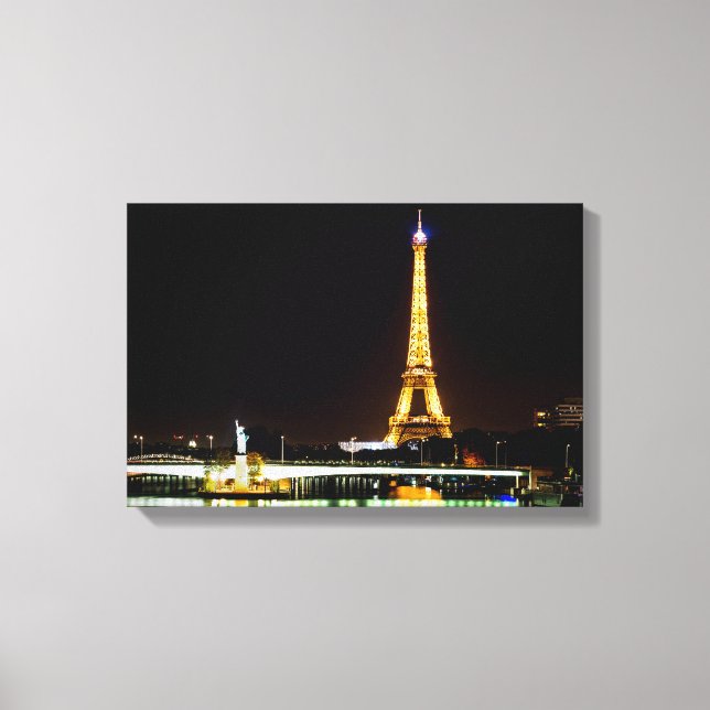 Illuminated Eiffel tower in Paris at night Canvas Print (Front)
