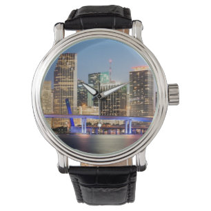 Illuminated skyline of downtown Miami at dusk Watch