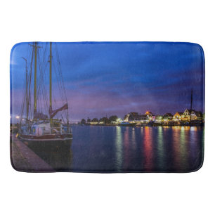 Illuminated Volendam harbor at night Bath Mat