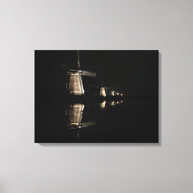 Illuminated windmills at night canvas print (Front)