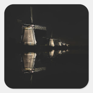Illuminated windmills at night sticker