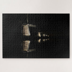 Illuminated windmills with reflection at night jigsaw puzzle