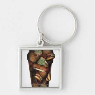 Illustration of a coffin filled with fast food keychain
