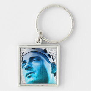 Illustration of a man wearing a cap of electrodes keychain