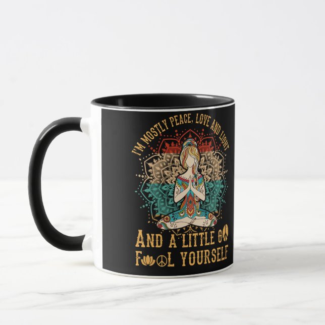 I'm Mostly Peace Love and Light A Little Go Yoga Mug (Left)