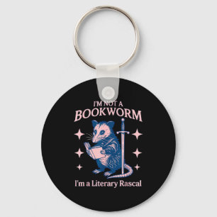 I'm not a bookworm i'm a literary rascal opossum keychain