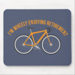 I'm Wheely Enjoying Retirement Funny Bicycle Mouse Pad<br><div class="desc">This mouse pad makes a great retirement gift for cyclists and anyone who loves to ride bikes. It has a slate blue background and features the funny message "I'm Wheely Enjoying Retirement" in orange above an illustration of a matching orange bicycle.</div>