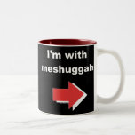 I'm With Meshuggah Mug<br><div class="desc">This witty Jewish humour mug features an arrow and the text "I'm with meshuggah." This is a Jewish slant on the I'm With Stupid items that you see.</div>