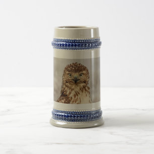 Immature Red-Tailed Hawk on the ground Beer Stein