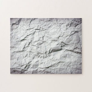 Impossible creased crumbled paper jigsaw puzzle