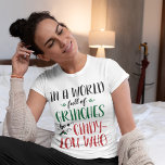 In a World of Grinches Be a Cindy-Lou Who Quote T-Shirt<br><div class="desc">This "In a World of Grinches, Be a Cindy Lou Who" t-shirt features an inspirational quote inspired by How the Grinch Stole Christmas, reminding us to spread kindness and positivity, just like the sweet-hearted Cindy Lou Who. With its playful design and cheerful message, this shirt is perfect for fans of...</div>