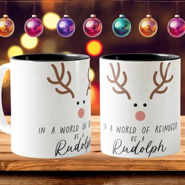 In a World of Reindeer Be a Rudolph Christmas Two-Tone Coffee Mug (Creator Uploaded)