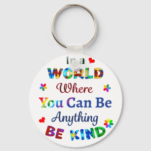 In a WORLD Where You Can Be Anything BE KIND Keychain