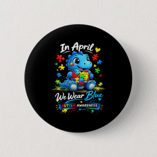 In april we wear blue autism awareness dinosaur 2 inch round button