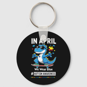 In April We Wear Blue Funny Skateboarding Dinosaur Keychain