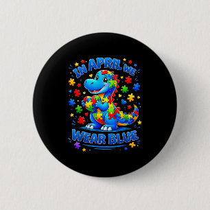 In april wear blue dinosaur autism awareness puzzl 2 inch round button