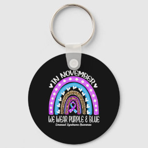 In November We Wear Purple And Blue Emanuel Syndro Keychain