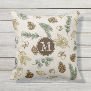 In the forest woodland pattern pinecones monogram outdoor pillow