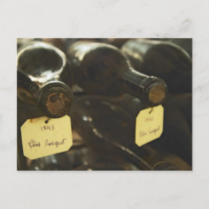In the underground wine cellar: lying bottles in postcard