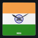 India Flag Dazzling Patriotic Square Wall Clock<br><div class="desc">India Flag Dazzling Patriotic Square Wall Clock in the colours and the elements of the India national flag covering the front of the clock. National flag colours are complemented with the text "India" on the bottom. Text is fully customizable using "Customize it!" feature. Feel free to change it, remove it...</div>