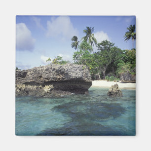 Indonesia. Rock formations along shore Magnet