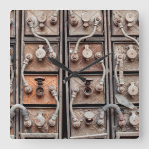 Industrial equipment in abandoned mine in Butte Square Wall Clock