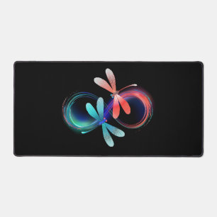 Infinity with glowing dragonflies desk mat