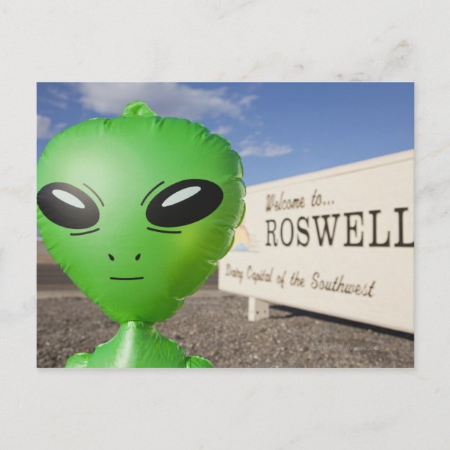 Inflatable alien with Welcome to Roswell sign in Postcard (Front)