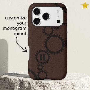 Initiale monogrammée aux engrenages et roues denté