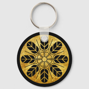 Inoue clan kamon in faux gold on black keychain
