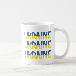 Inscription Ukraine in blue and yellow colours Coffee Mug