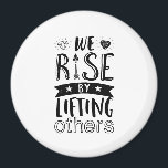 Inspirational Kind Quote We Rise By Lifting Others Magnet<br><div class="desc">Inspirational motivation quote to keep you inspired and motivate others around you.

Beautiful saying about being kind and supporting each other. We rise by lifting others.

Background colour can be customized to your desired colour.</div>