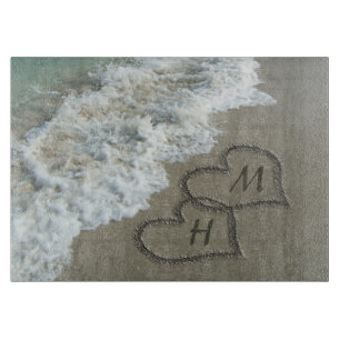 Interlocking Hearts on Beach Sand Cutting Board