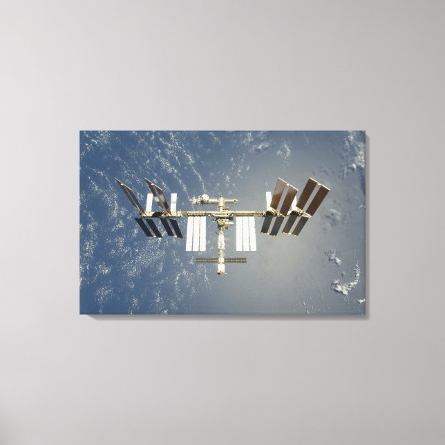 International Space Station backdropped Canvas Print (Front)