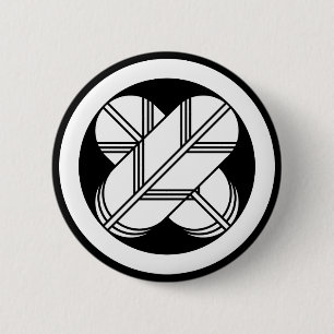 Intersecting hawk feathers in a circle 2 inch round button