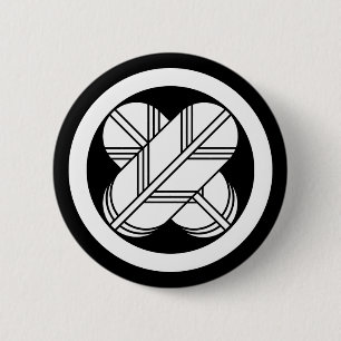 Intersecting hawk feathers in circle 2 inch round button