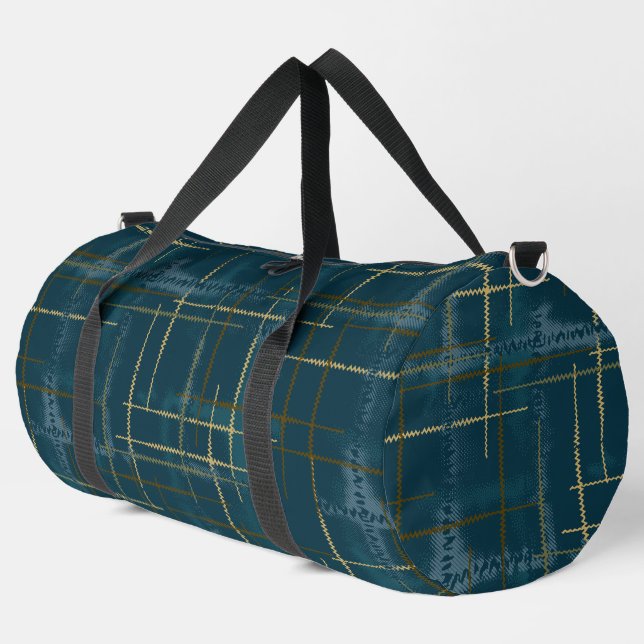 Intersecting lines and shapes creates a textured duffle bag (Left Corner)
