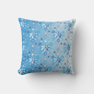 Intricate blue and white stars and snowflakes throw pillow