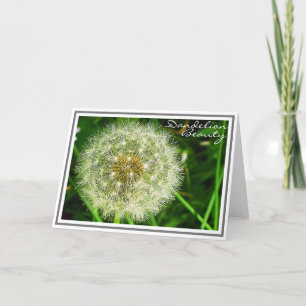 Intricate Dandelion Flower with Green Foliage Card