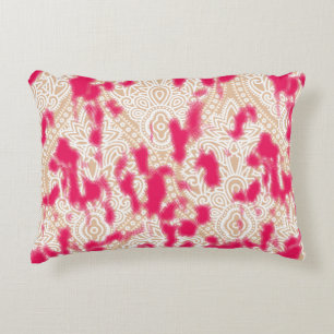 Intricate textile design featuring a rich pink pat accent pillow