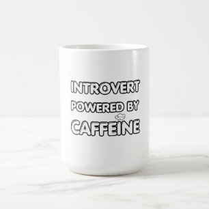 Introverted powered by caffeine  coffee mug