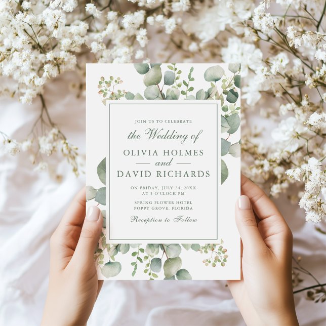Invitation Elégant Mariage botanique Eucalyptus (Elegant Greenery Eucalyptus Botanical Wedding Invitation in hands next to tiny white flowers.)