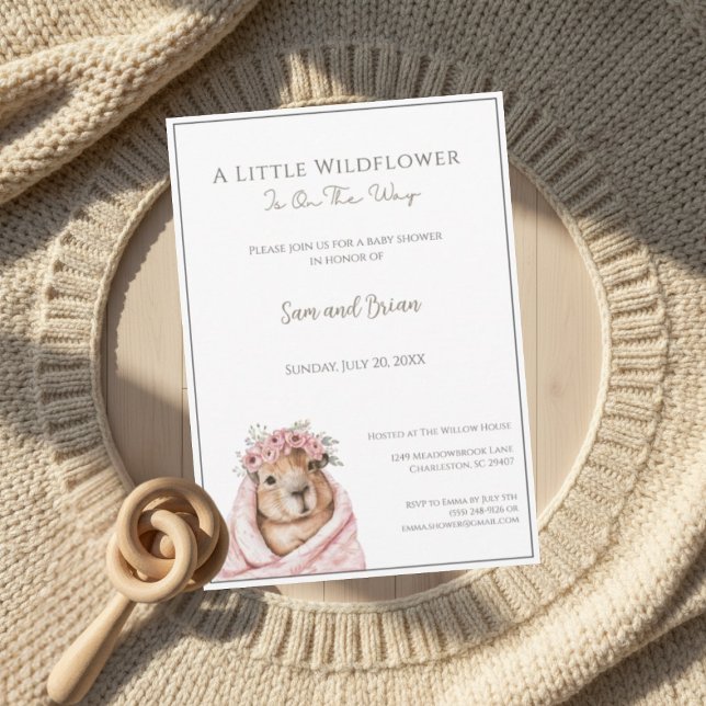 Invitation Fête de bébé capybara • Petite fleur sauvage (warm boho invitation mockup with wooden rattle and knit details on soft neutral background)