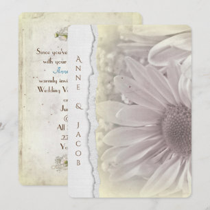 Invitation macro marguerite jaune pâle sur papier déchiré