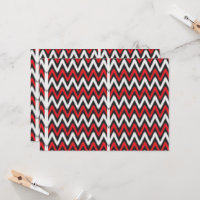 un motif en zigzag rouge et noir sur fond blanc